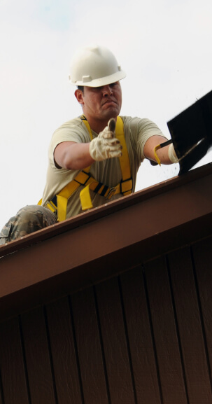 Roswell-yellow-construction-worker-roof-hard-hat-job-1596171-pxhere 1